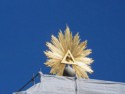 Golden eye on top of the Church of the Holy Ghost (being remodeled)